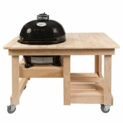 Primo CJRH-614 Junior Oval Ceramic Charcoal Kamado Grill On Cypress Countertop Table